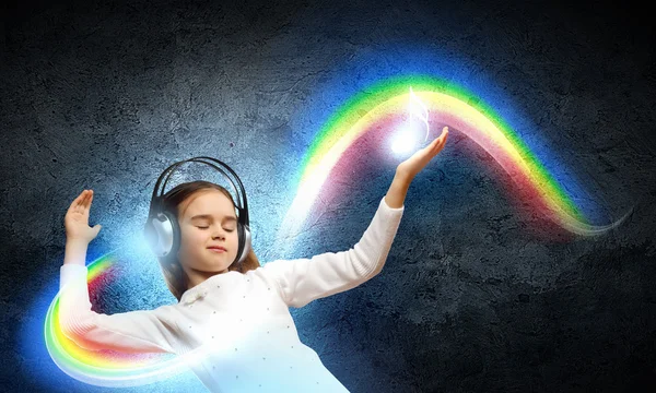 Little girl in headphones — Stock Photo, Image