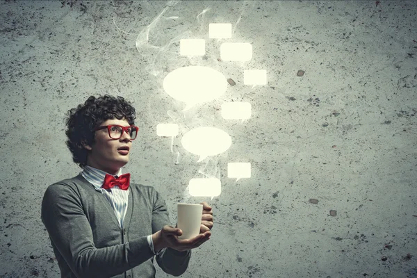 Young man with blank frames for text — Stock Photo, Image