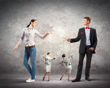 Businesspeople with marionettes clipart