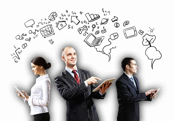 Three young people in business suits — Stock Photo, Image