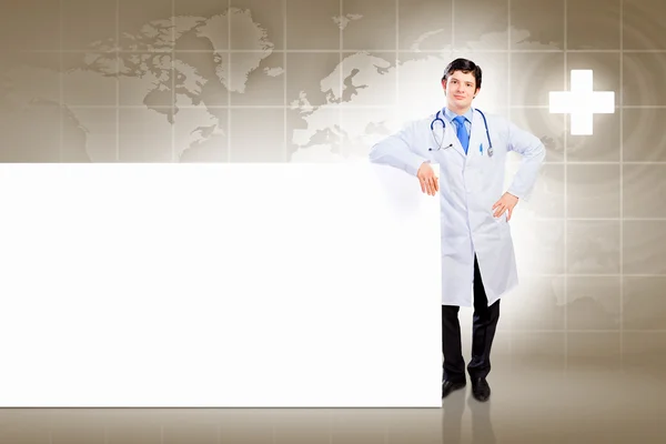 Male doctor with banner — Stock Photo, Image