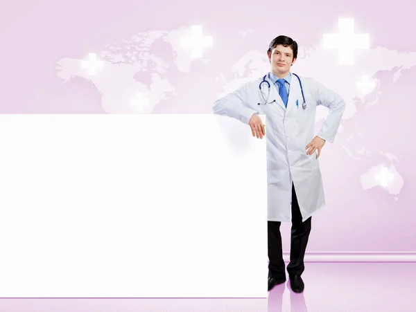 Médico masculino com banner — Fotografia de Stock