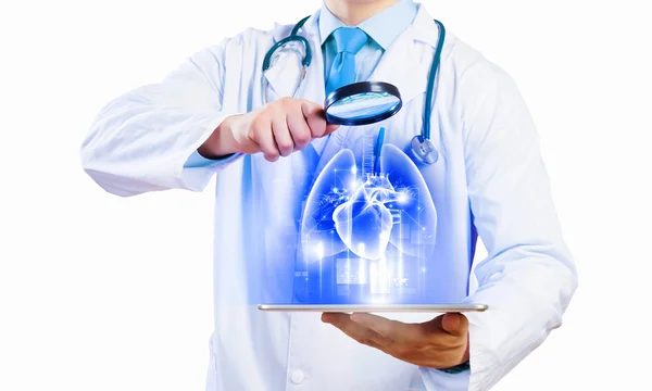 Doctor holding tablet pc — Stock Photo, Image