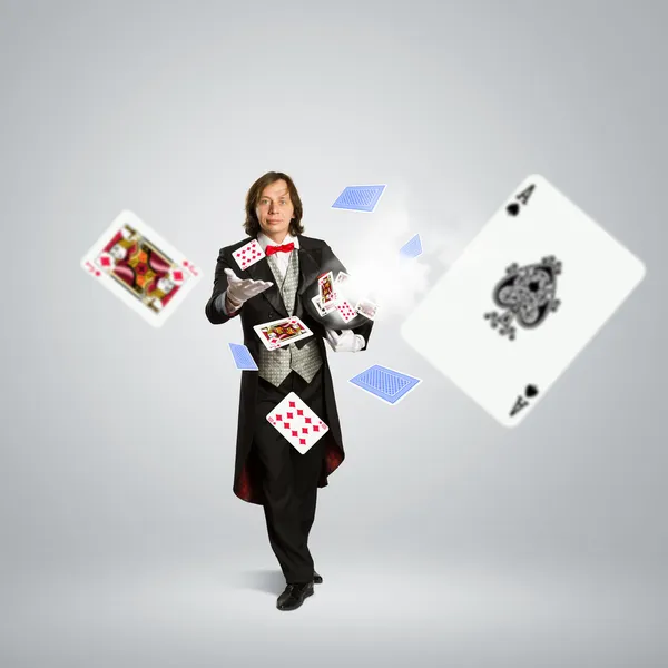 Magician with dice — Stock Photo, Image