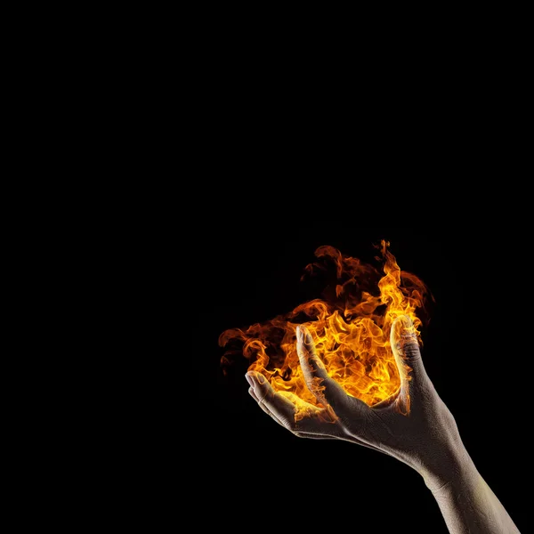Вогонь в руці — стокове фото