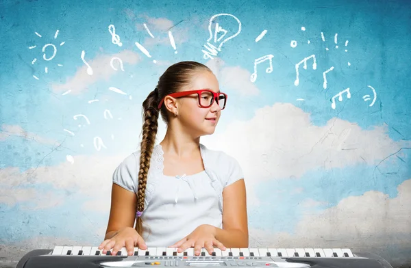 School girl with piano — Stock Photo, Image