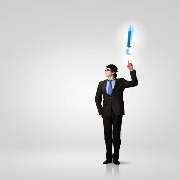 Businessman and exclamation mark — Stock Photo, Image