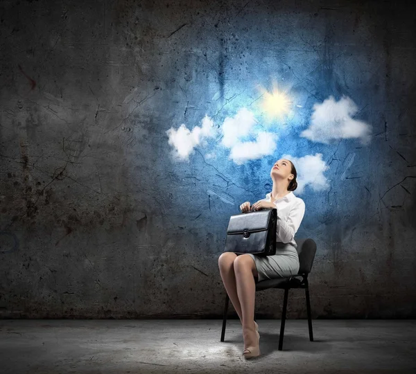 Businesswoman  on chair — Stock Photo, Image