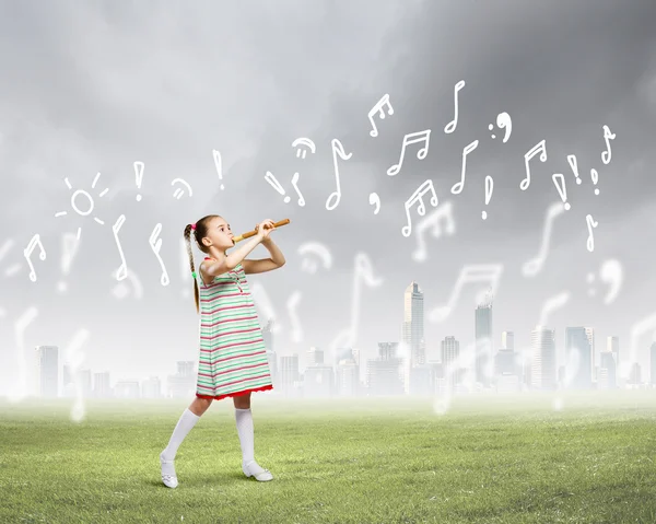 Kid with flute — Stock Photo, Image