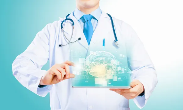 Doctor holding tablet pc — Stock Photo, Image