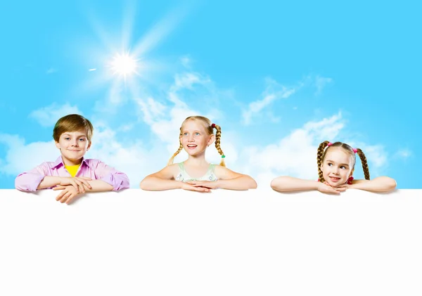 Kids with banner — Stock Photo, Image