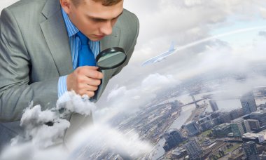 Man looking in magnifier clipart