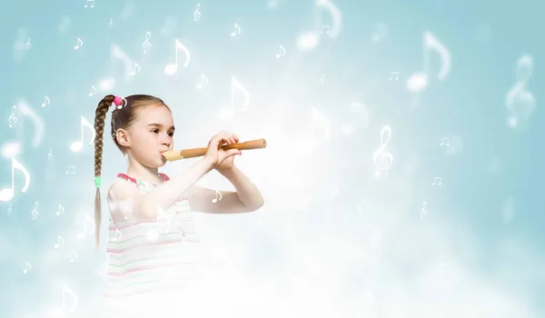 Kid with flute — Stock Photo, Image