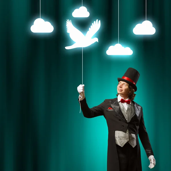 Magician in hat Stock Picture