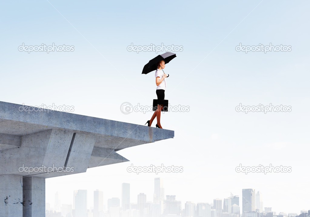 Businesswoman on bridge