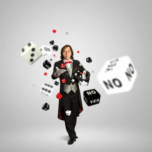 Magician with dice — Stock Photo, Image