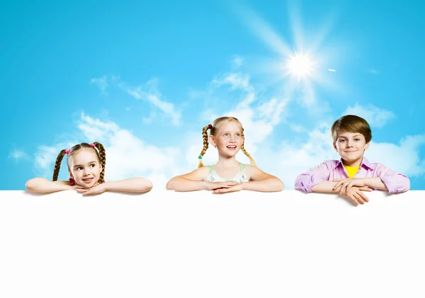 Kids with banner — Stock Photo, Image
