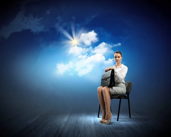 Businesswoman  on chair — Stock Photo, Image