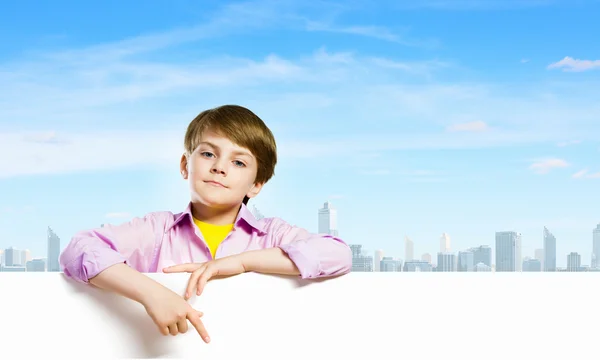 Kid with banner — Stock Photo, Image