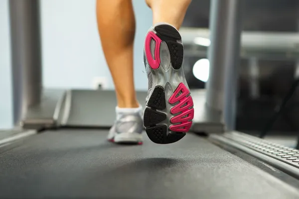 Running on treadmill — Stock Photo, Image