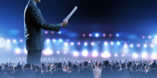 Business man on stage — Stock Photo, Image