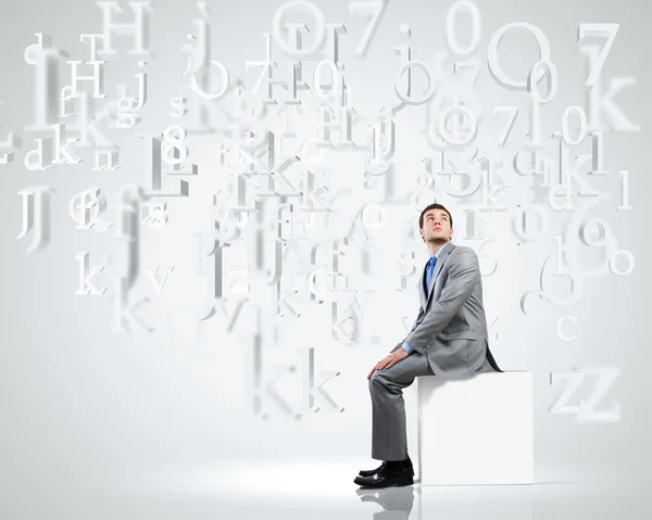 Man on cube — Stock Photo, Image