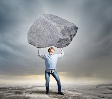 Guy lifting stone clipart