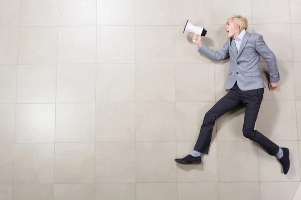 Homem de negócios com megafone — Fotografia de Stock