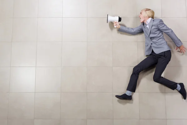 Businessman with megaphone — Stock Photo, Image