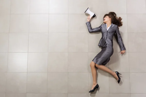 Mujer de negocios con megáfono — Foto de Stock