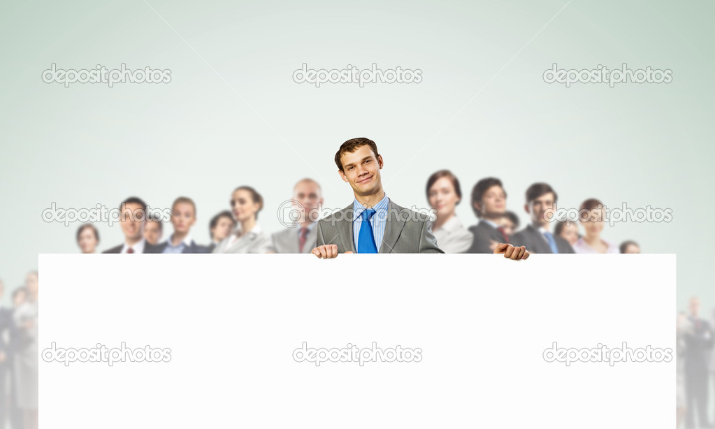 Businessman with blank banner