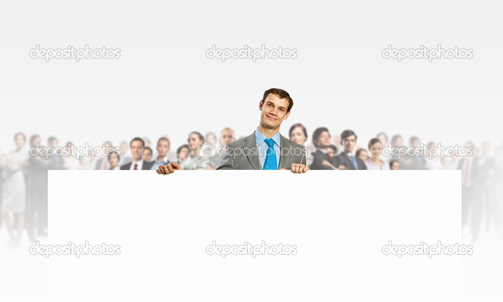 Businessman with blank banner