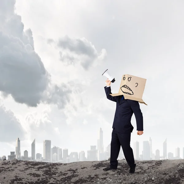 Businessman with megaphone — Stock Photo, Image