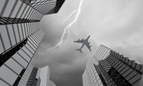 Airplane above city — Stock Photo, Image