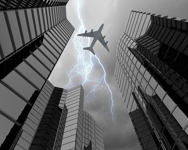 Bottom view of airplane flying above skyscraper in stormy sky