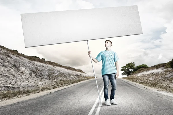 Adolescente con pancarta — Foto de Stock