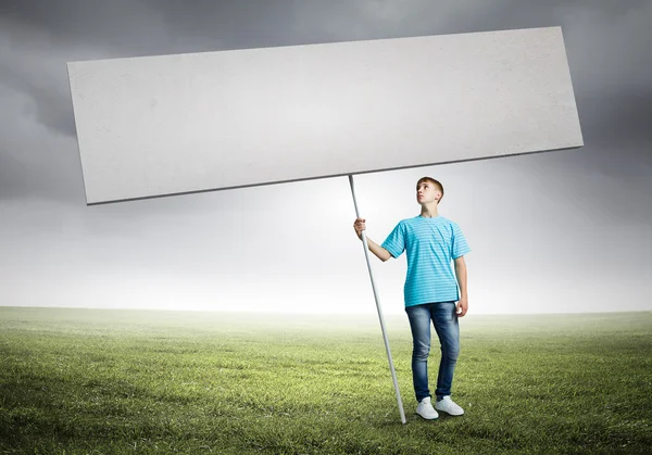 Teenager with banner — Stock Photo, Image