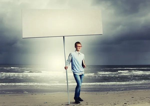 Tonåring med banner — Stockfoto