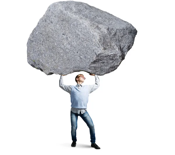 Guy levantando piedra — Foto de Stock