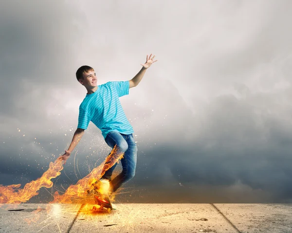 Teenager on skateboard — Stock Photo, Image