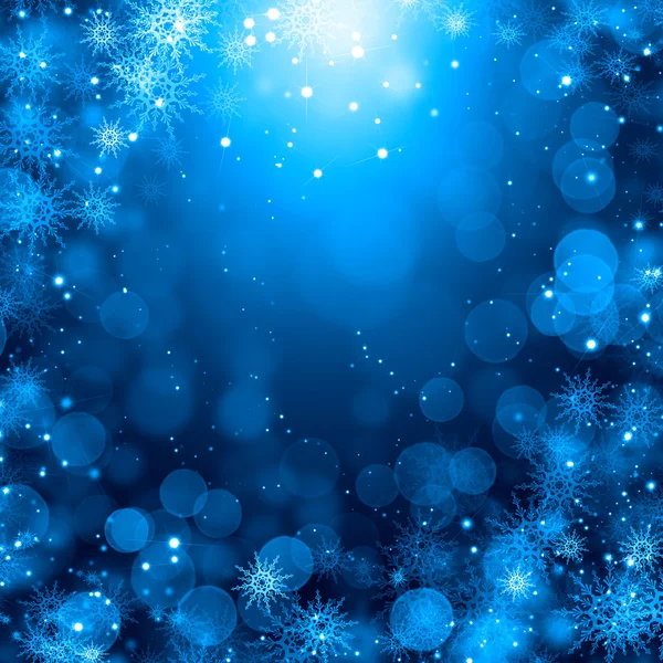 Schneeflocken auf blau — Stockfoto