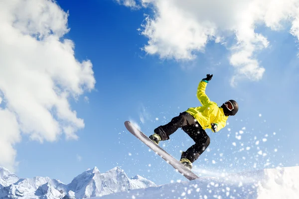 Snowboarding in mountains — Stock Photo, Image