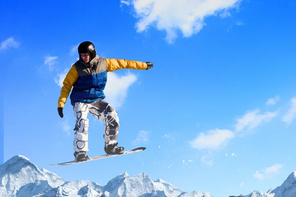 Snowboarding in mountains — Stock Photo, Image