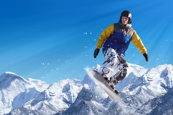 Snowboarding in mountains — Stock Photo, Image