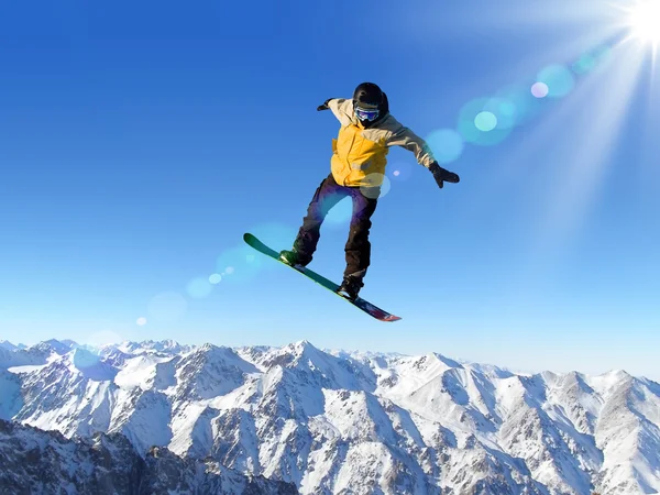 Snowboarding in mountains — Stock Photo, Image