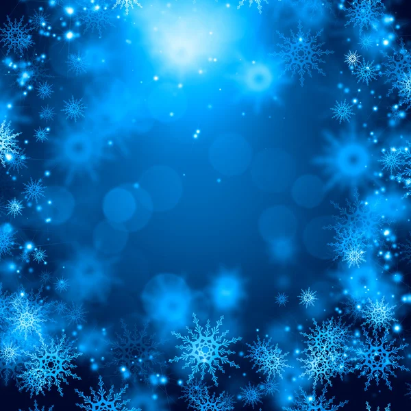 Snowflakes on blue — Stock Photo, Image