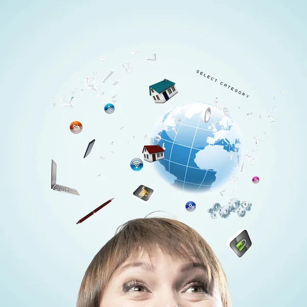 Half of face of businesswoman with business items above head — Stock Photo, Image