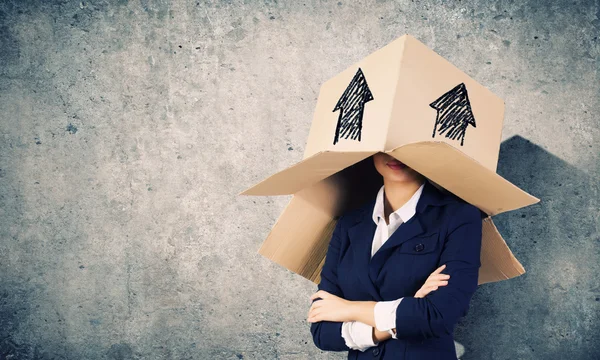 Woman with box on head — Stock Photo, Image