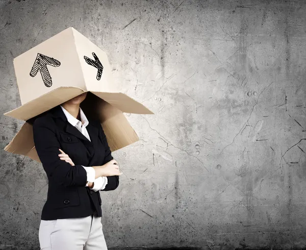 Woman with box on head — Stock Photo, Image