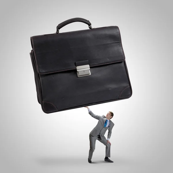 Businessman with suitcase — Stock Photo, Image